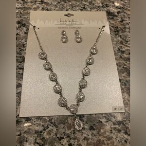 Nicole Miller earrings and necklace set.